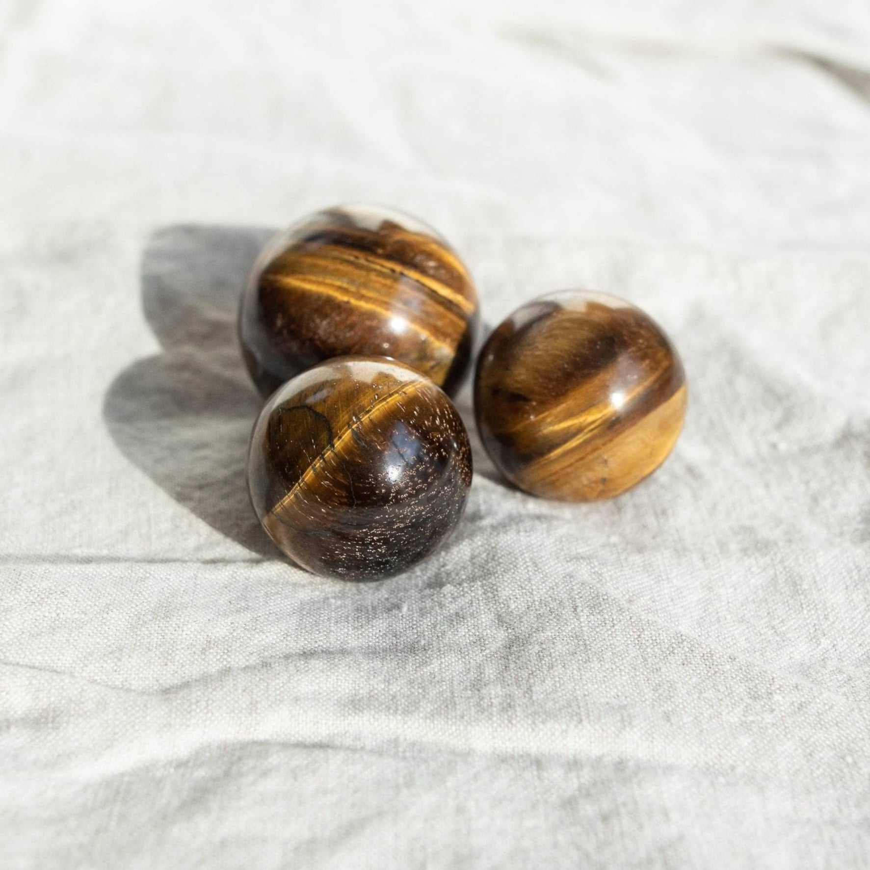 Tiger Eye Sphere with Tripod by Tiny Rituals